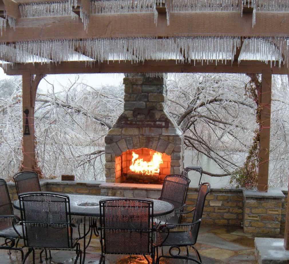 Outdoor patio fireplace setting