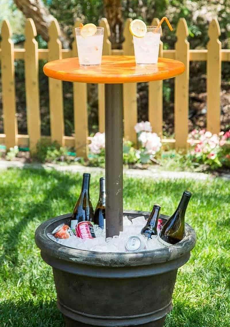 Small table with a bucket of ice base