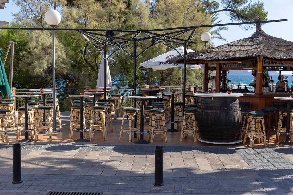 Seaside outdoor bar with a thatched gazebo that