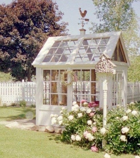 Glass and wood garden shed in white
