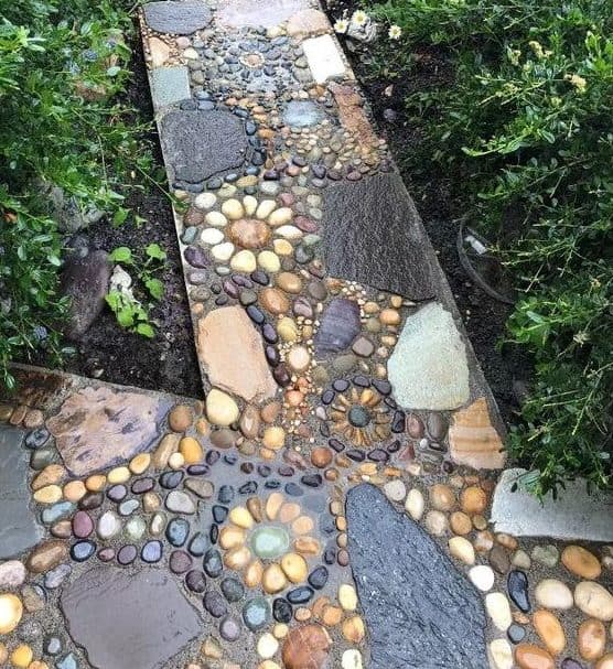 Creative stones and pebbles turned into one-of-a-kind garden pathway