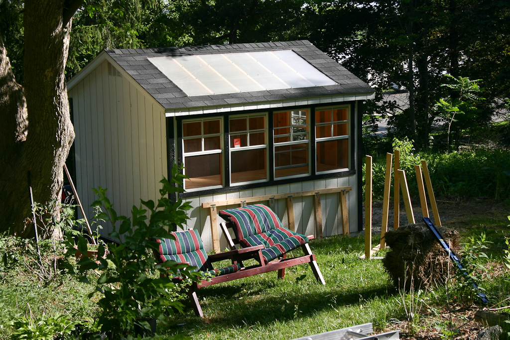 Narrow garden with small shed