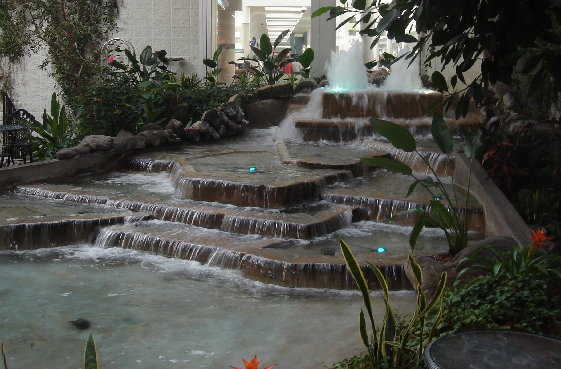 Tiered stone waterfall fountain