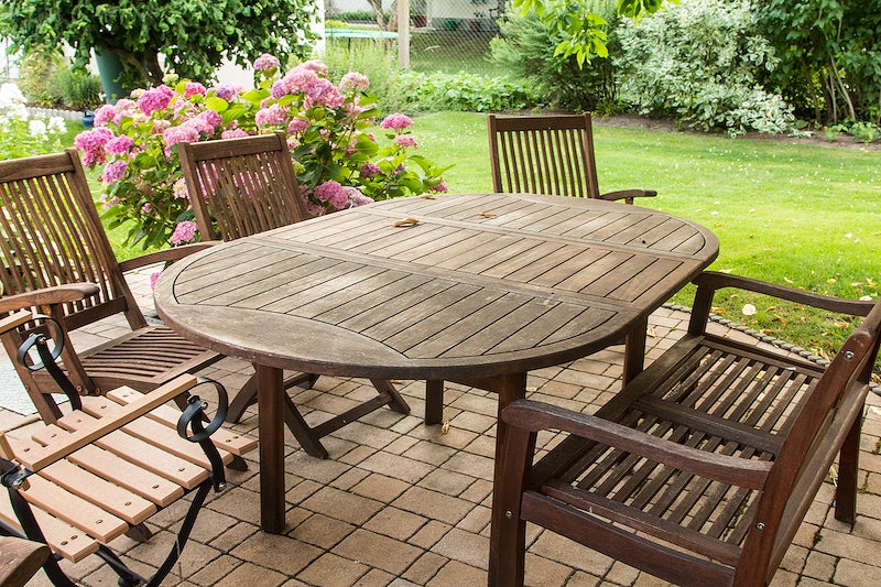 Farmhouse-style garden dining table and chairs